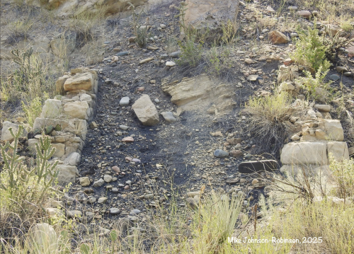Scale house foundation. A scale was located under the train tracks  inside this foundation. This was how they weighed and shipped the coal. 